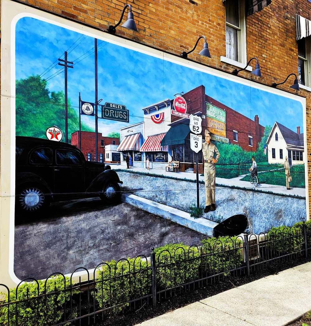 Mural of 1940s Broadway in Grove City showing Dale's Drug Store, a Texaco sign and US 62